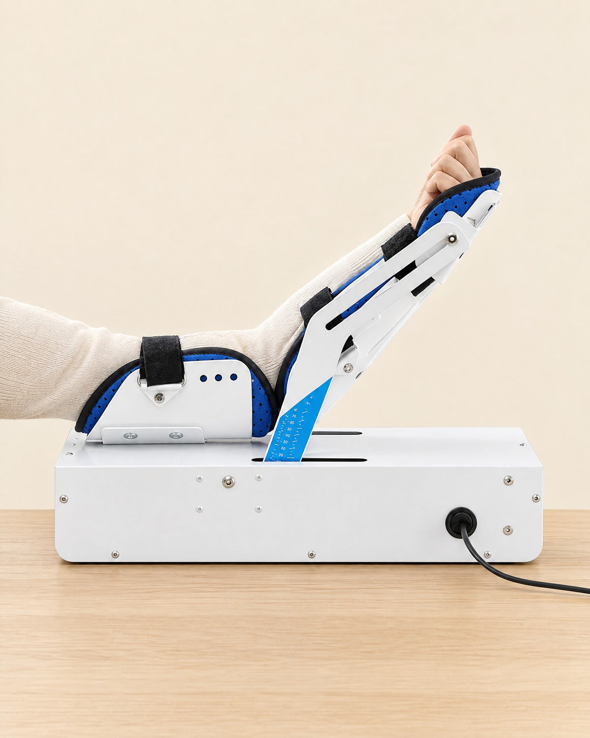 An arm strapped into Glide Elbow, forearm cradle raised