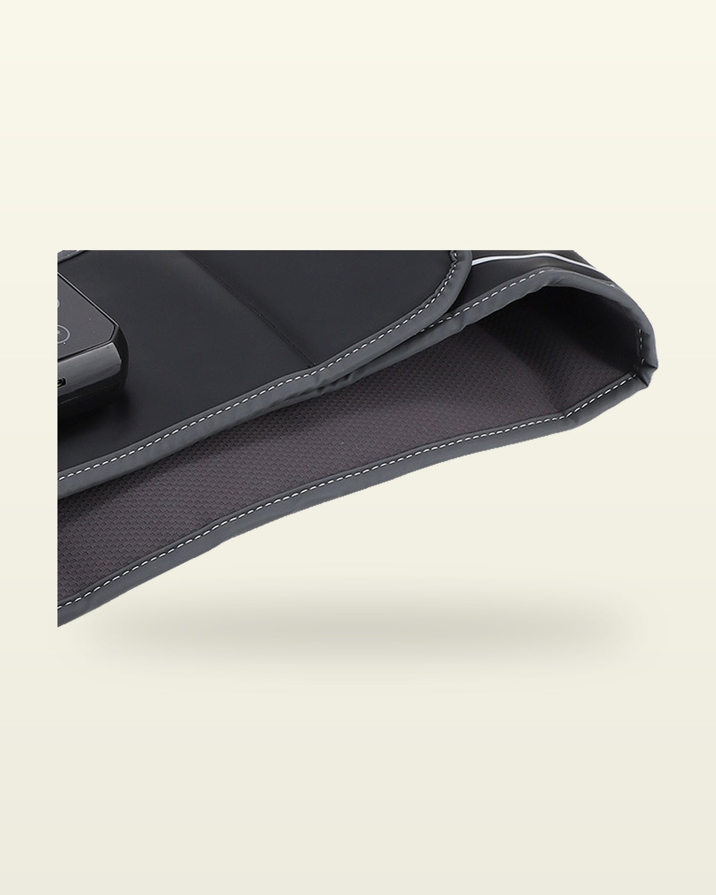 Perforated mesh lining and piped, topstitched edge of the Holtrow Press belt