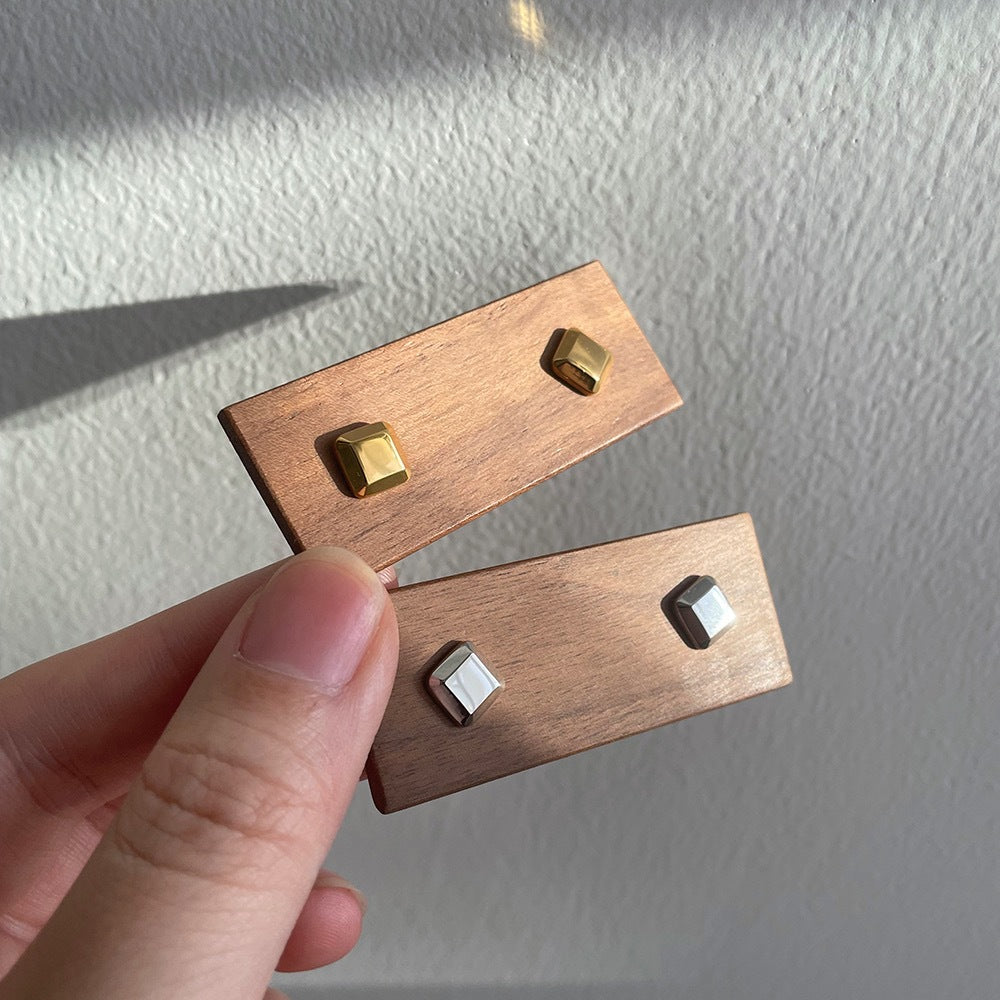 Carre square stud earrings worn