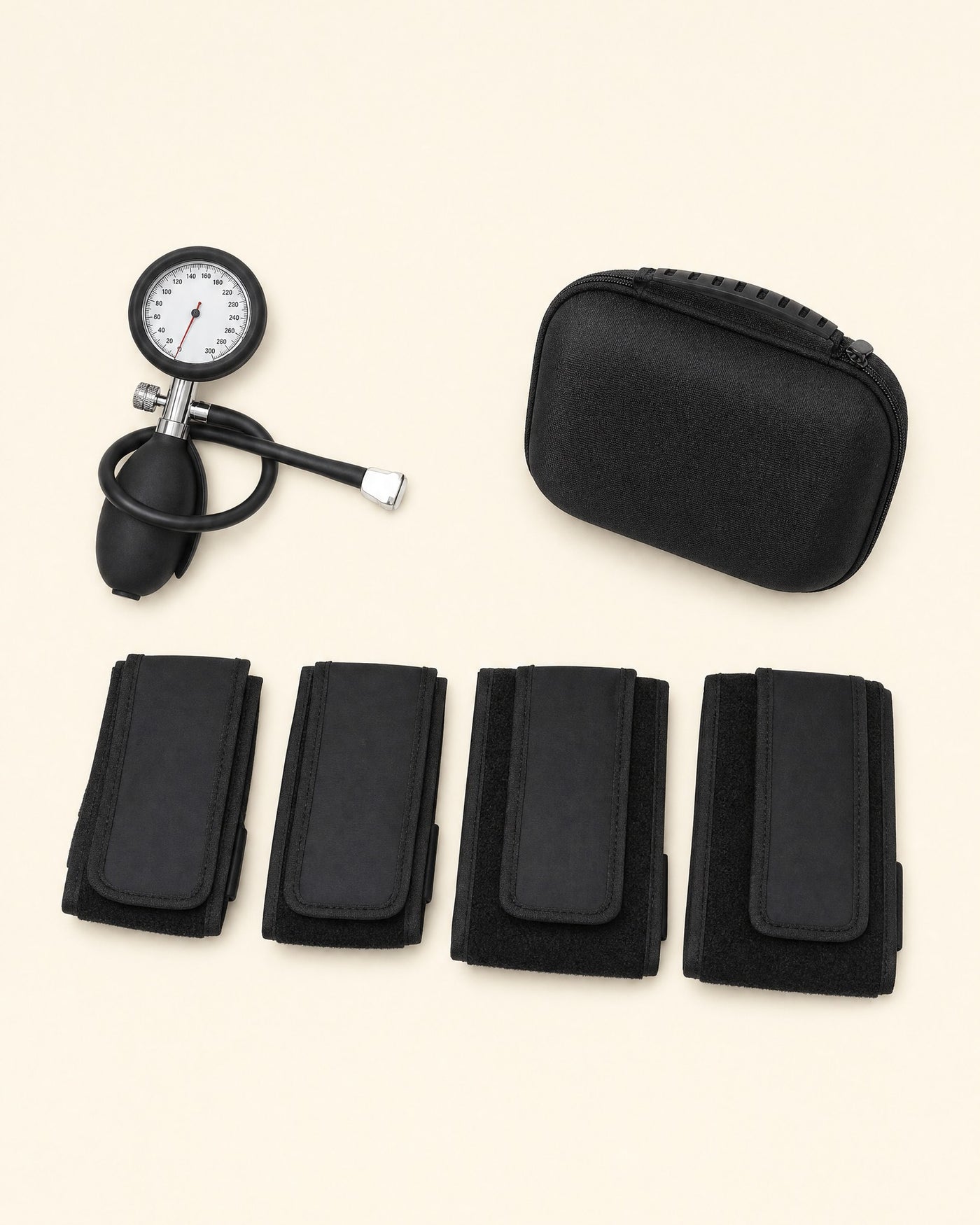 Holtrow Surge kit flatlay — gauge, bulb, hard case and four folded cuffs