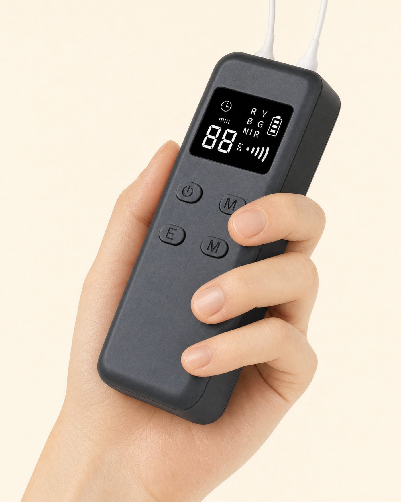 The Holtrow Dawn controller in hand, showing the timer, the R Y B G NIR channels and the battery