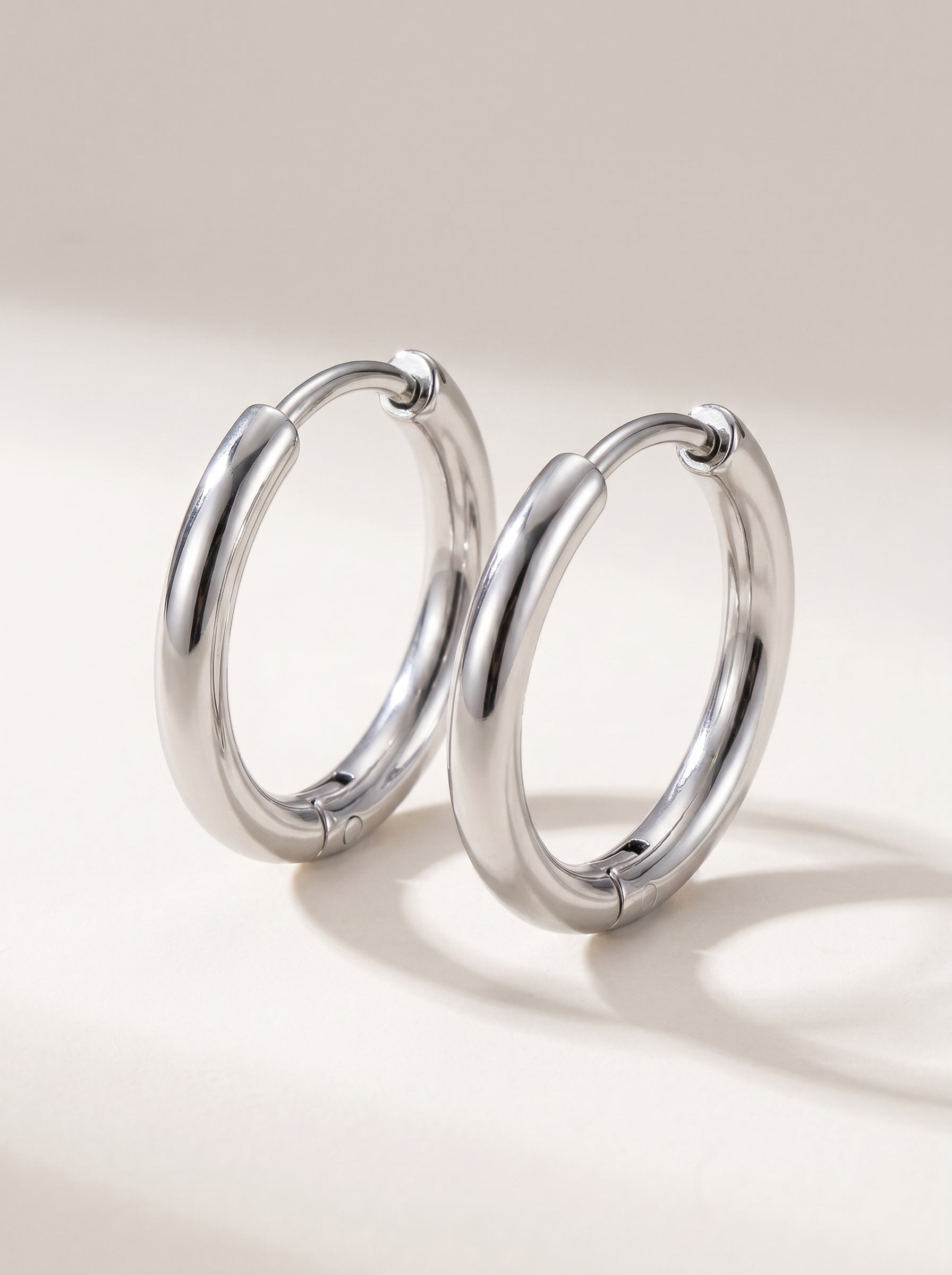 Cercle silver huggie hoop earring detail