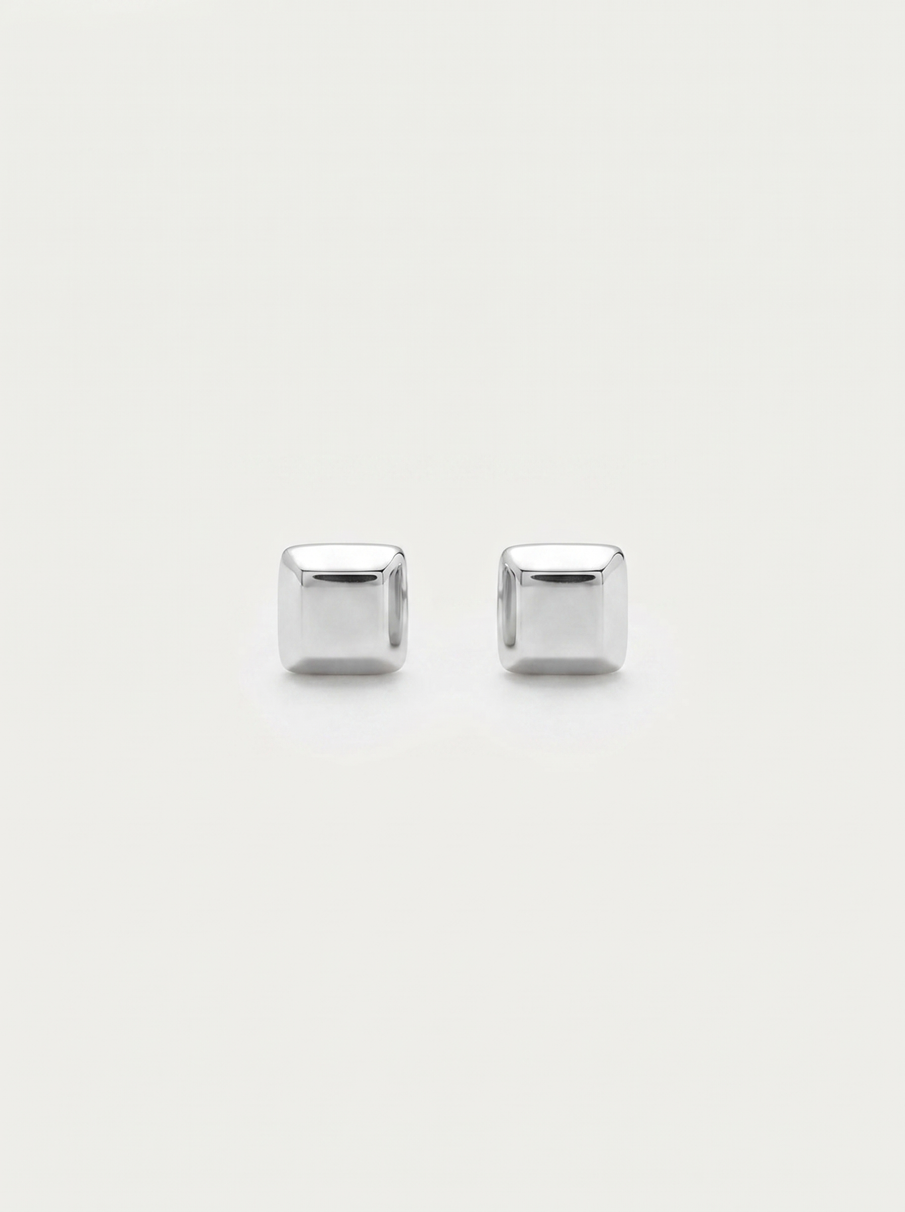 Carre silver cube stud earrings on clean white background