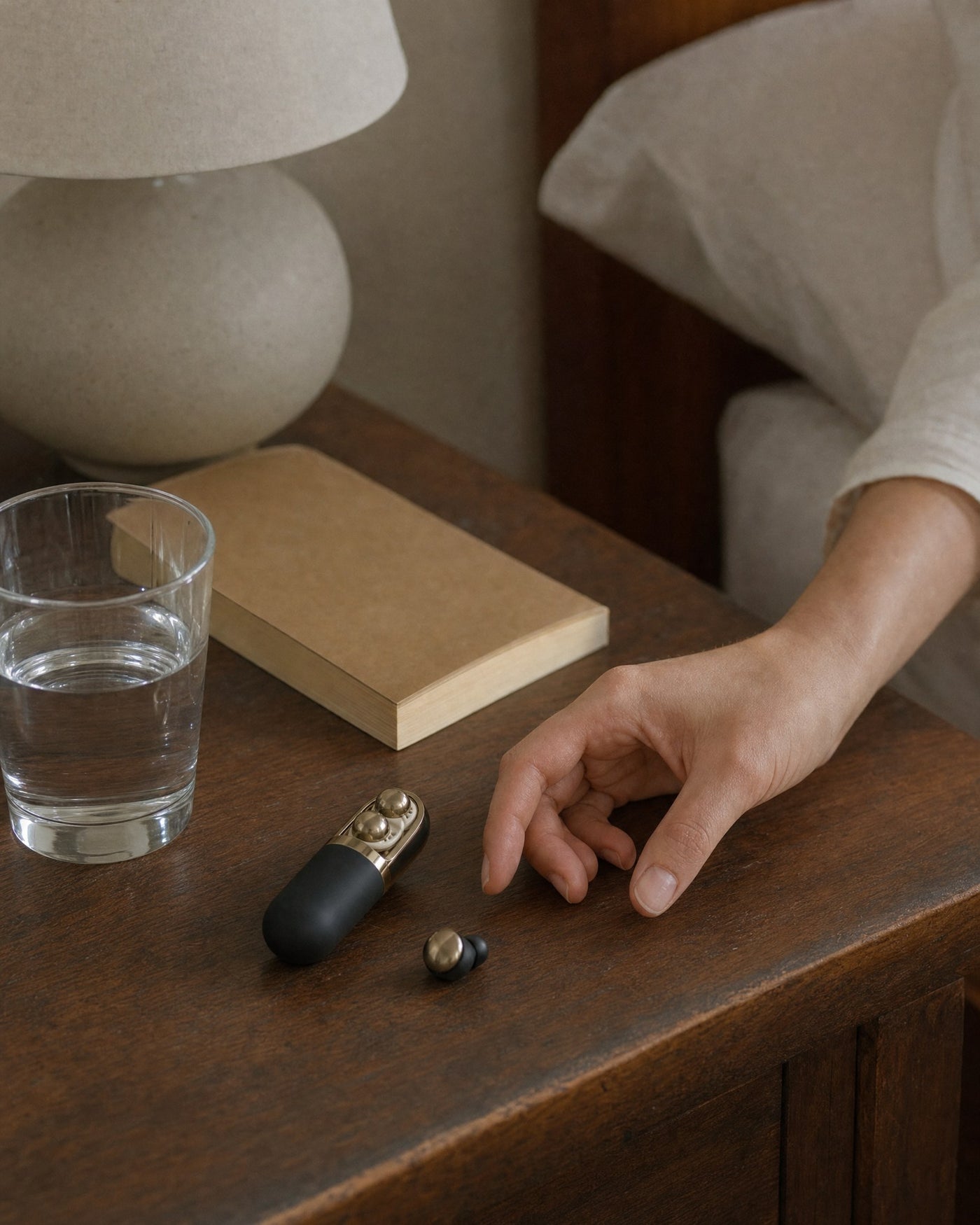 The Lull capsule set down on a bedside table at the end of the day