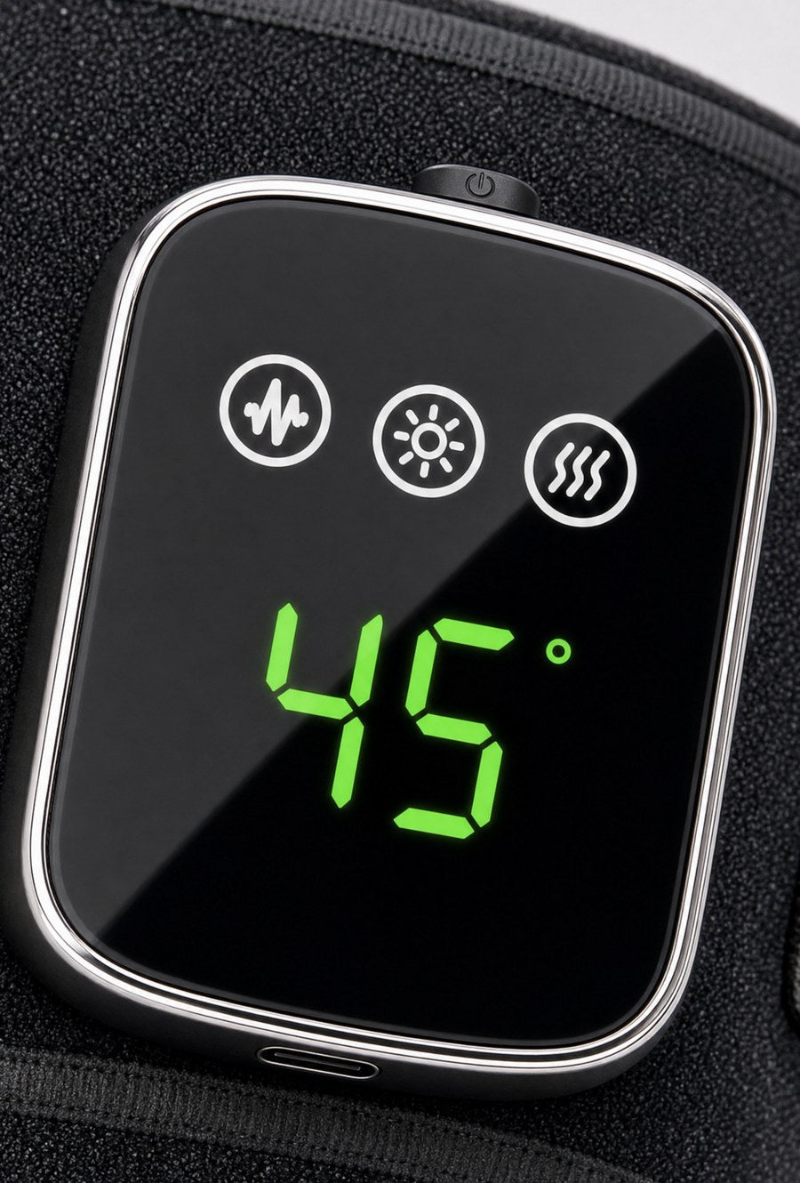 The touch pod: massage, light and heat keys above a digital display